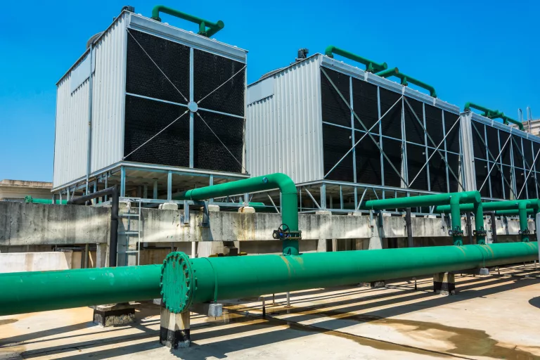 Sets of cooling towers in data center building